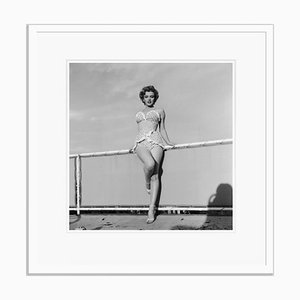 Beach Belle Silver Gelatin Resin Print Framed in White by Hulton Archive