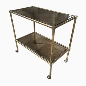 Mid-Century Modern French Gilt Metal & Faux Bamboo Bar Cart with Smoked Glasses by Maison Baguès, 1960s