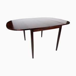 Dining Table in Rosewood with Extensions by Arne Vodder, 1960s