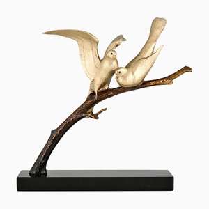 Scultura Art Déco in bronzo raffigurante due uccelli su un ramo di Andre Vincent Becquerel