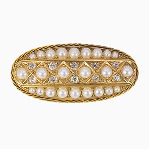 Broche antiguo de oro con diamantes tallados y perlas, década de 1900