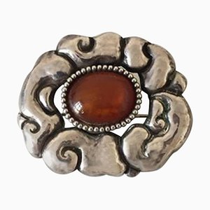 Brooch with Red Stone by Thorvald Bindesbøll for Holger Kysters Smithy