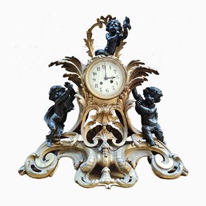 Reloj de péndulo estilo Louis XV de bronce