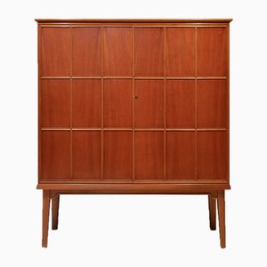 Mid-Century Cabinet with Relief Doors in the Manner of Oscar Nilsson, 1940s