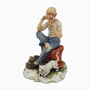 Capodimonte Figurine Seated Man with Cat Darning Socks