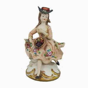 Seated Girl Figurine with Fruit Basket from Capodimonte