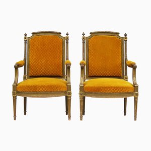 Französische Armlehnstühle aus vergoldetem Holz & Gesso, 1950er, 2er Set