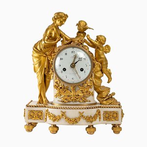 Horloge en Bronze Doré et Marbre Blanc