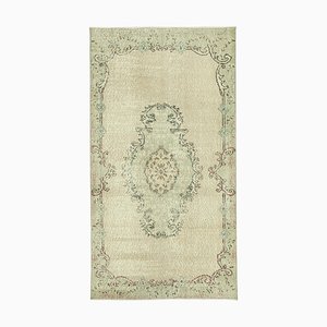 Tappeto sovratinto beige