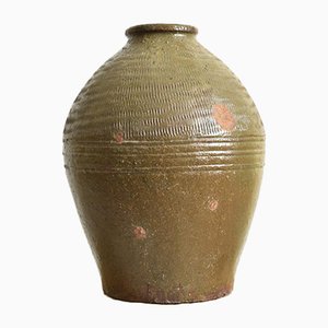 Jarrón antiguo pequeño de terracota