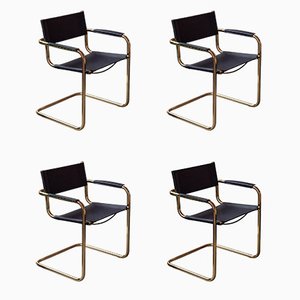 Röhrenförmige Esszimmerstühle aus Messing & schwarzem Leder, 1970er, 4 . Set