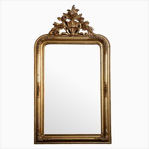 Espejo francés antiguo de madera dorada y tallada