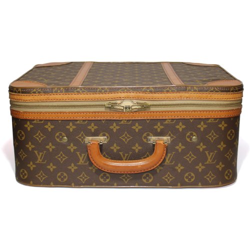 A vintage Louis Vuitton suitcase for sale in an antique shop in Santa Fe,  New Mexico Stock Photo - Alamy