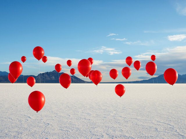 Andy Ryan, Group of Red Balloons on Salt Flats, Photograph for