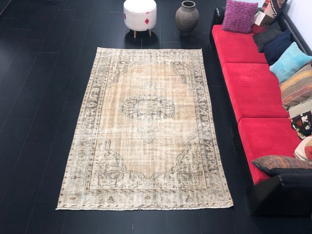 Antique Faded Wool Rug for sale at Pamono