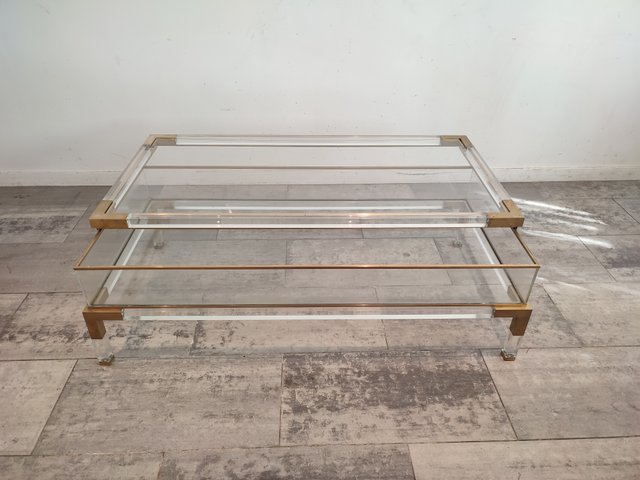 Acrylic brass on sale coffee table