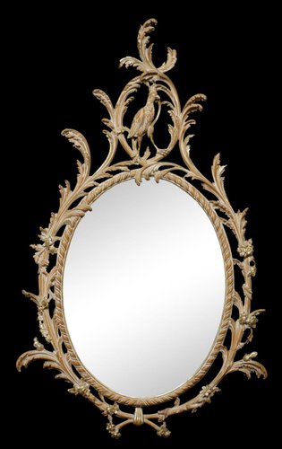Espejo tallado ovalado
