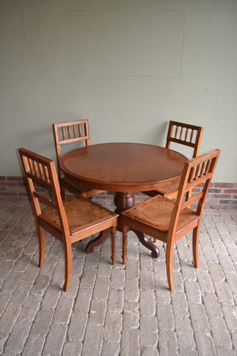 Antique round dining table on sale and chairs