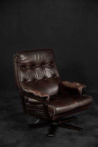 Dark brown leather swivel chair deals
