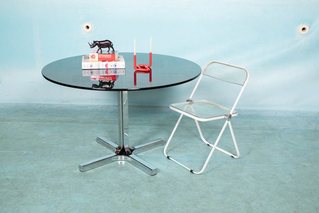 Round smoked glass dining table and chairs sale
