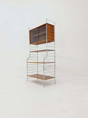 String System: Cabinet with Flip Door | Buy String online at A+R