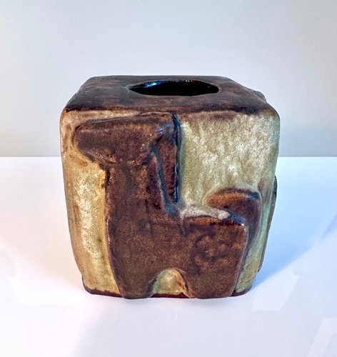 brutalist-cube-shaped-studio-