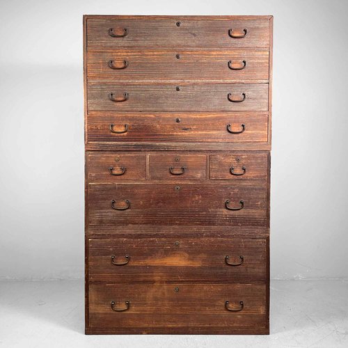 Traditional Japanese paulownia wood tansu chest specifically designed for kimono storage, featuring natural moisture control and insect-resistant properties for cultural heritage preservation