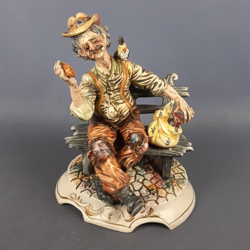 Vintage Ceramic Sculpture of Seated Merchant from Capodimonte