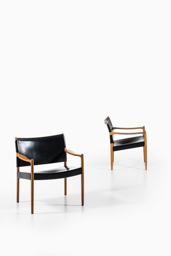 Model Premiar Leather And Oak Easy Chairs By Per Olof Scotte For