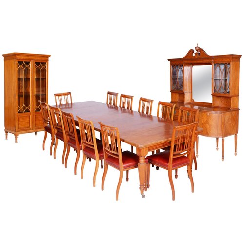 Juego de comedor británico de madera satinada, siglo XIX con 12 sillas de  Maple & Co. en venta en Pamono