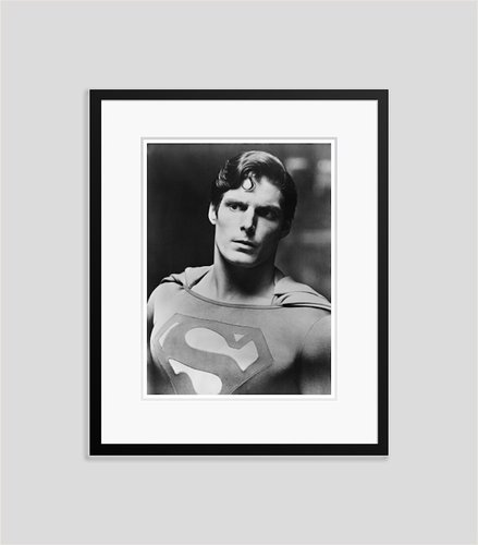 Christopher Reeve sitting in Superman Costume Photo Print (8 x 10)