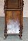 Burr Walnut Bookcase with Brass Gallery 17