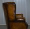 Vintage Chesterfield Porters Ohrensessel aus Braunem Leder 18