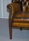 Vintage Chesterfield Porters Ohrensessel aus Braunem Leder 13