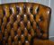 Vintage Chesterfield Porters Ohrensessel aus Braunem Leder 6