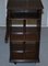 Edwardian Solid Oak Revolving Bookcase with Lift Up Desk Piece, 1900s 5