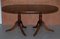 Extending Tilt Top Oval Dining Table in the Regency Style Solid Hardwood Castors 5