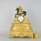Uhr aus vergoldeter Bronze mit Darstellung des Napoleon, der die Alpen überquert, 19. Jh 20