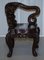 Japanese Qing Dynasty Carved Hardwood Dragon Corner Armchair, 1880s 2