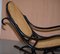 Rocking Chair Bergère Vintage en Rotin Noirci de Thonet 10