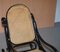 Schwarzer ebonisierter Vintage Bergere Schaukelstuhl aus Rattan von Thonet 5