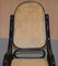 Vintage Ebonized Black Rattan Bergere Rocking Chair from Thonet 4