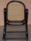 Schwarzer ebonisierter Vintage Bergere Schaukelstuhl aus Rattan von Thonet 11