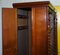 Bookcase with Hidden Built in Coat Cupboards 16