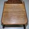 Black Forest Carved Oak Bobbin Hall Chair Depicting Two Friends Hugging 7