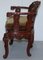 Vintage Chinese Red Lacquered Carved Elm Armchair with Heavy Foliage Detailing 17