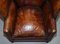 Chestnut Brown Leather Regency Porters Wingback Armchair, 1810s 8