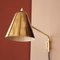 Verstellbare Mid-Century Wandlampe oder Wandleuchte aus Messing von Jacques Biny für Luminalité, 1950er 1