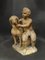 Französisches Terrakotta Kind mit Hund, 1700er 20