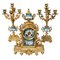 French Ormolu and Porcelain Mantel Clock and Candelabra, 19th Century, Set of 3 1